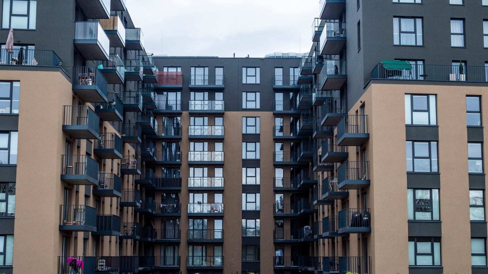 Completed mid-rise apartment building with balconies